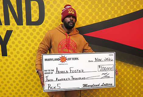 Playing the same number on five Pick 5 tickets gave Arnold Foster a $200,000 combined prize.