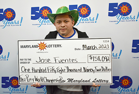 Jose Fuentes of Hyattsville stopped by Lottery headquarters on St. Patrick’s Day to claim his $158,092 FAST PLAY prize.