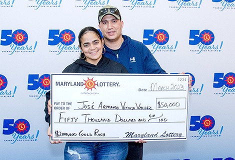 José Armando Vicioso Valdez and his wife happily celebrate his Lottery luck.