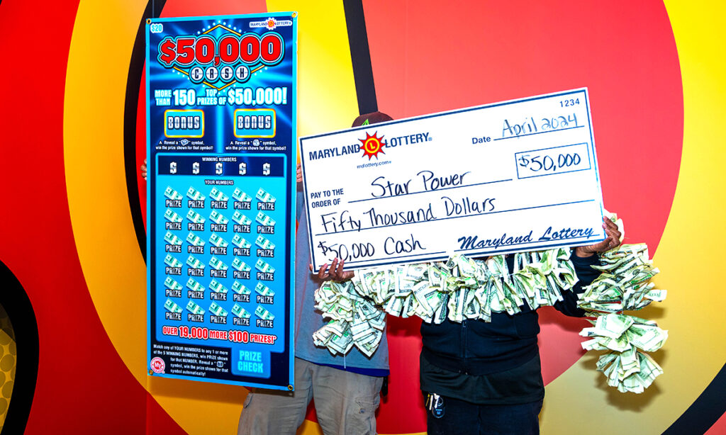 Bowie winner Bren Bren celebrated her top-prize win from a $50,000 Cash scratch-off with her friend at Lottery headquarters.