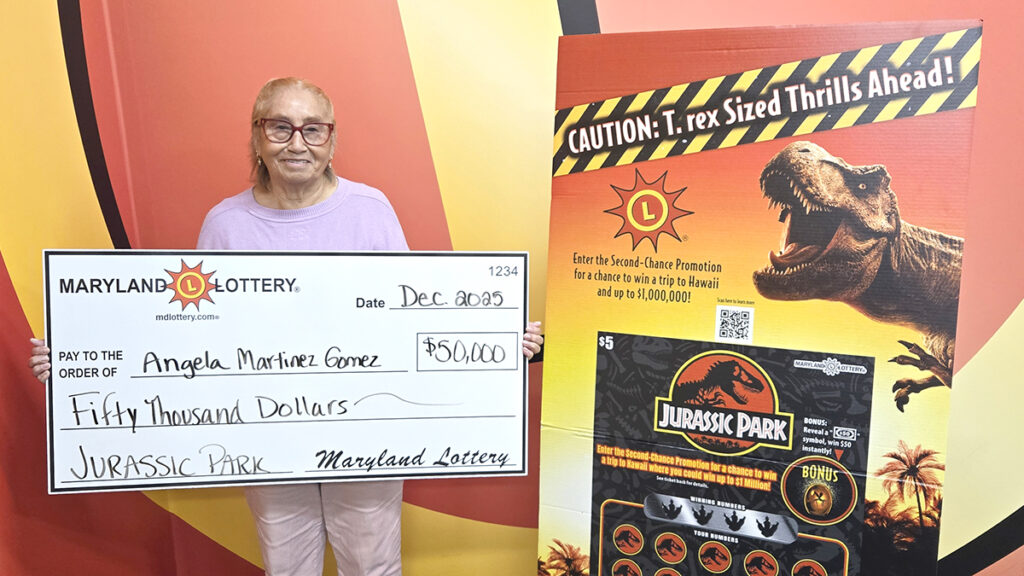 Angela Martinez-Gomez, of Forestville, was all smiles after she won $50,000 on the $5 JURASSIC PARK scratch-off ticket.