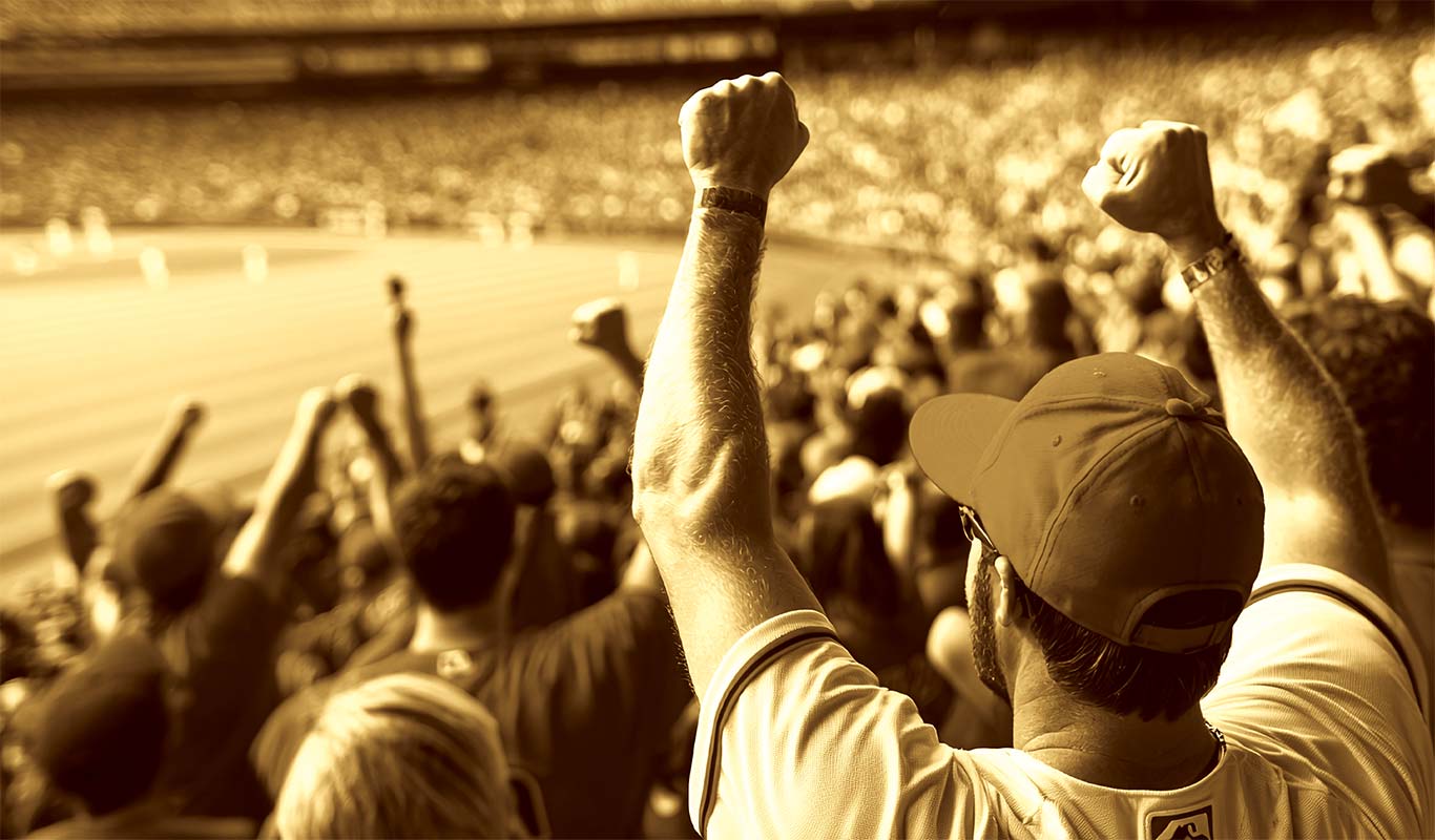 sepia toned photo of crowd at baseball game
